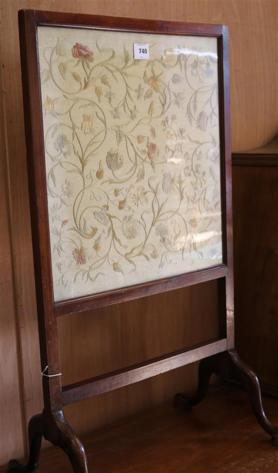 A mahogany firescreen inset with a Chinese embroidered silk panel W.54cm